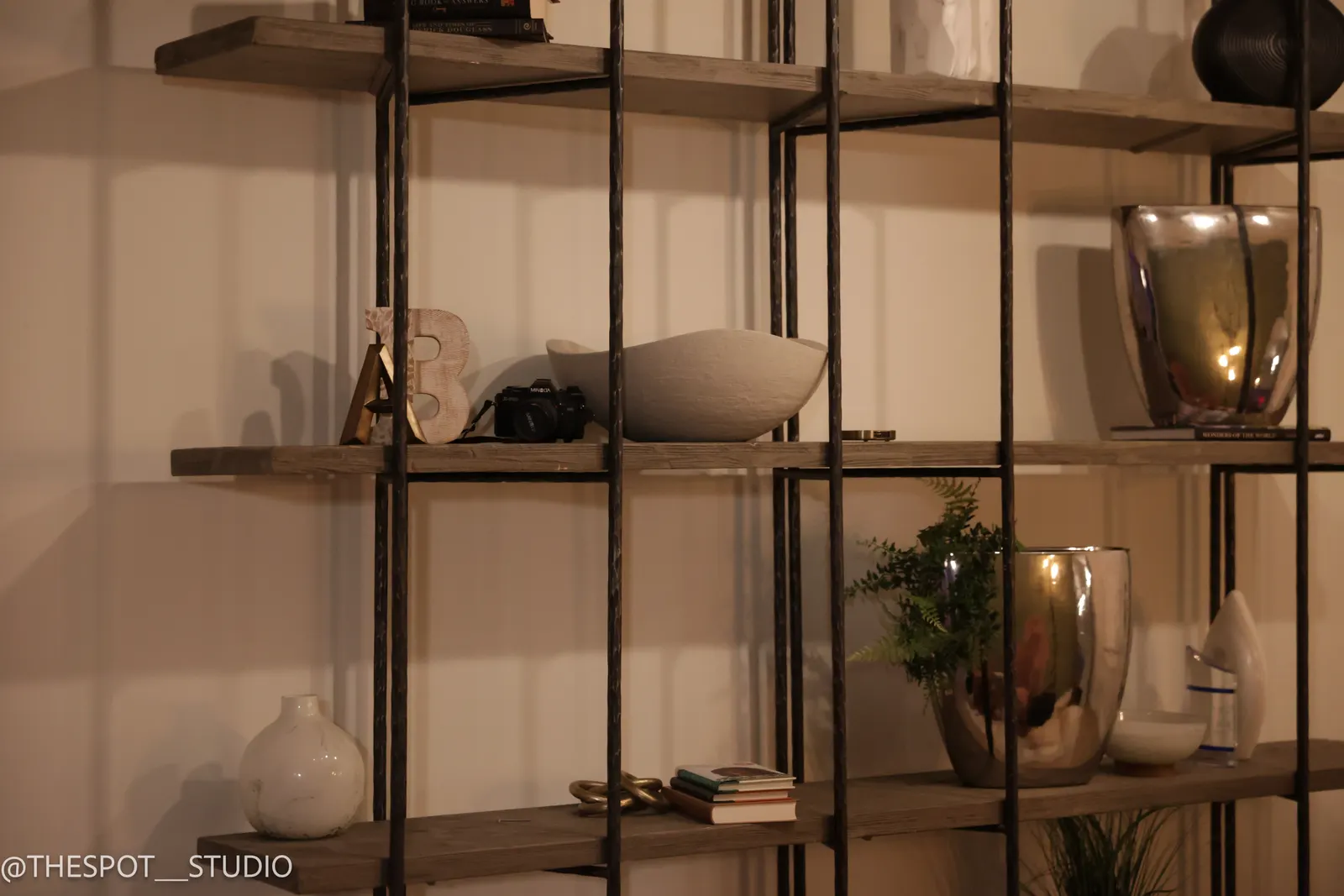 Styled shelving and decor in the Primary Studio